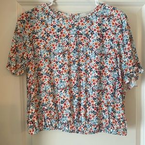 Floral blouse with cinched bottom